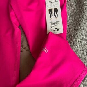 Brand new Alo yoga airbrush leggings in Neon Pink.